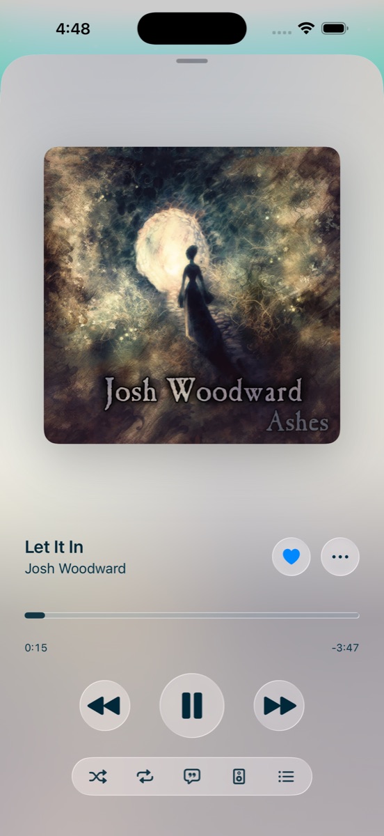 Reef's Now Playing screen: album artwork over a soft glass card with playback controls